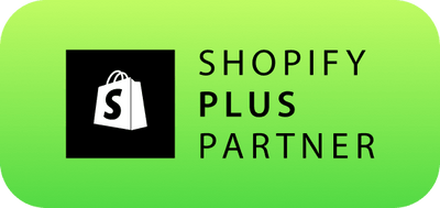 A green rounded square badge with a black square containing the Shopify shopping bag logo and the text 'SHOPIFY PLUS PARTNER' in black.
