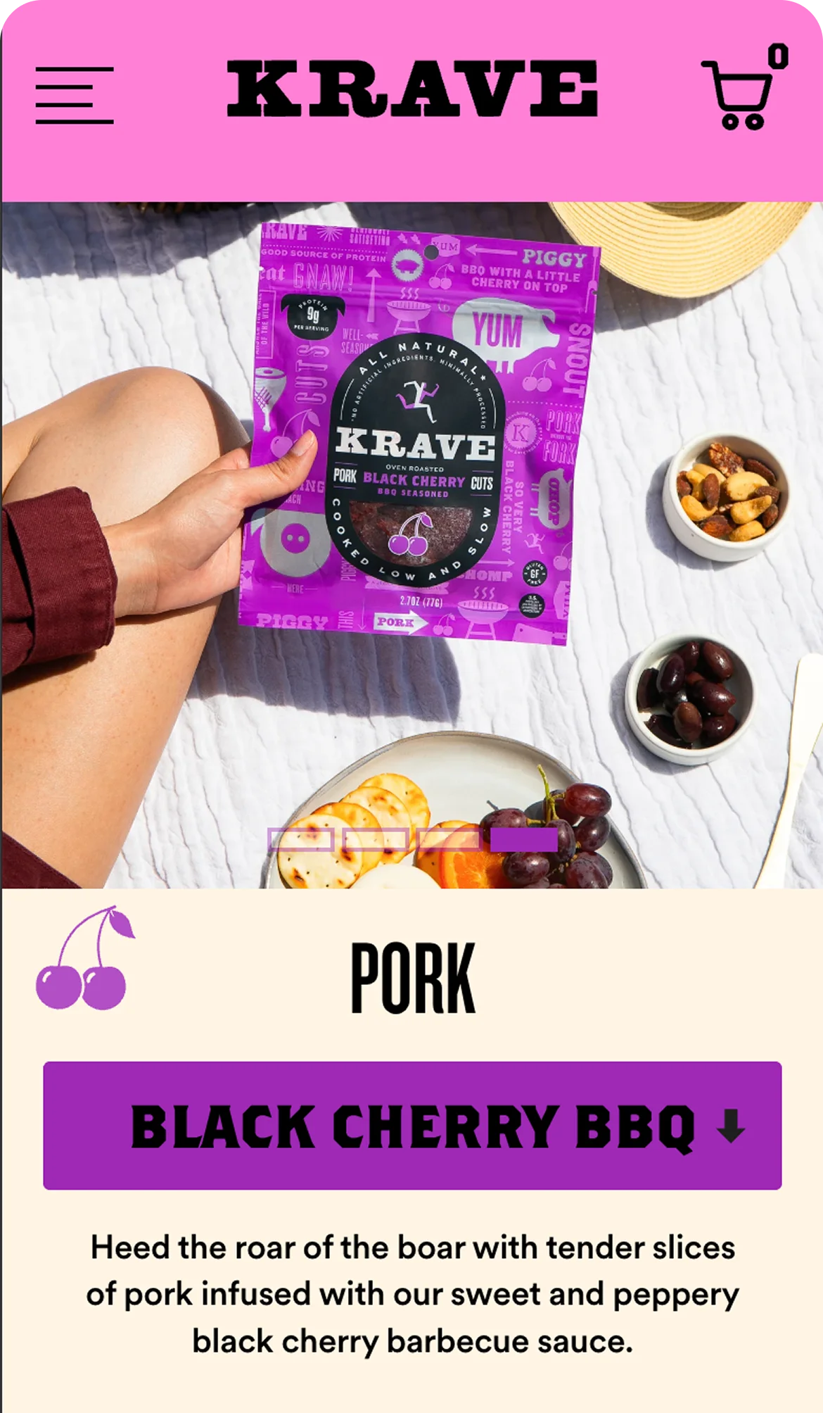 Krave Black Cherry BBQ pork package with a person holding it, set against a casual dining background.