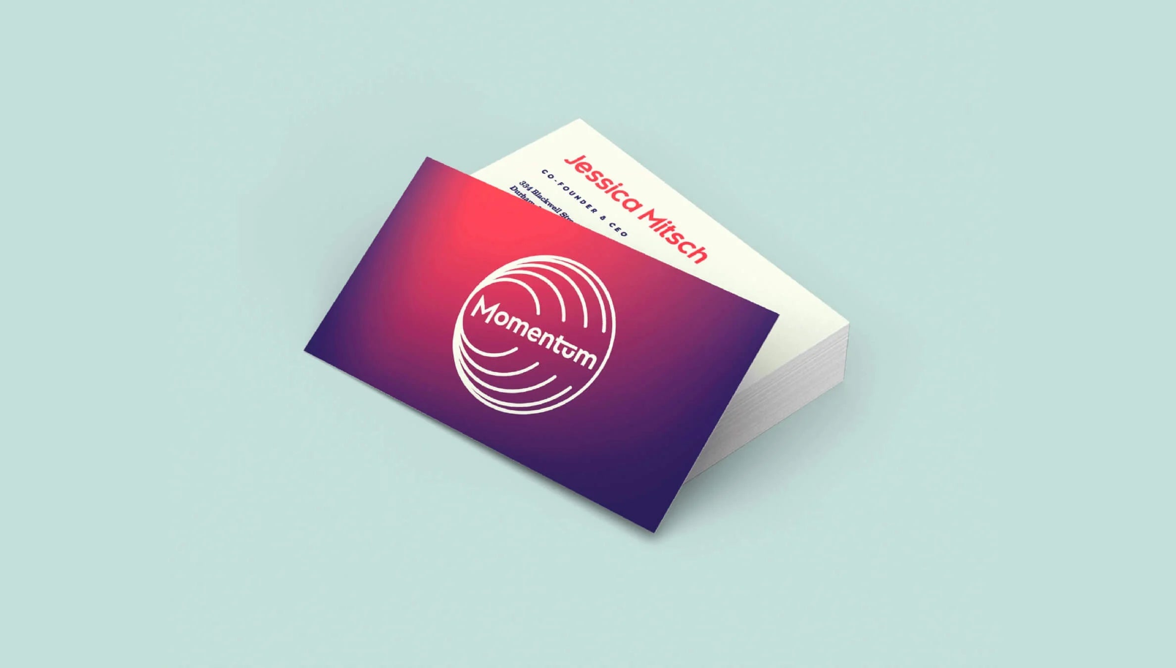 Gradient business card with 'Momentum' logo on a light blue background
