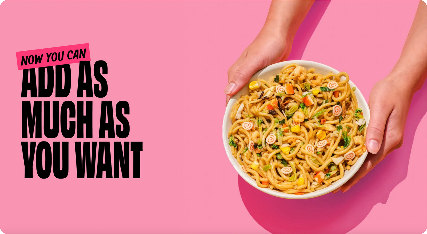 Person holding a bowl of noodles with text on a pink background