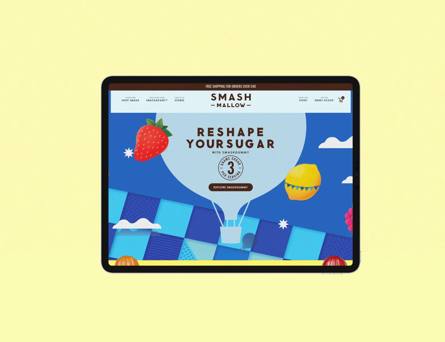 Tablet displaying the Smash Mallow website on a yellow background