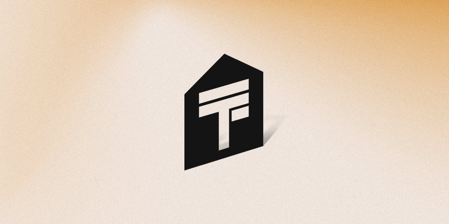 Black geometric logo on a beige background