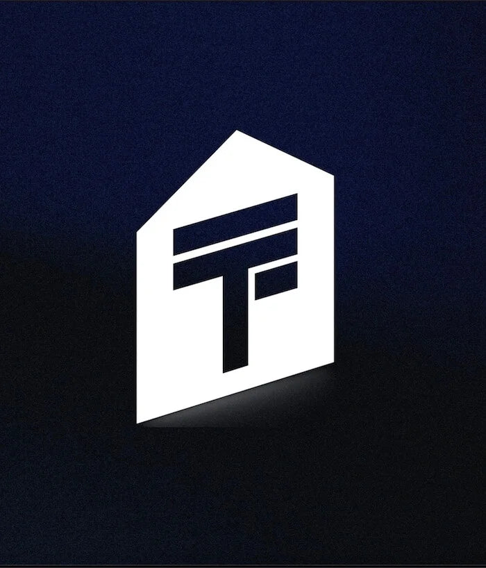 White logo on a dark blue background